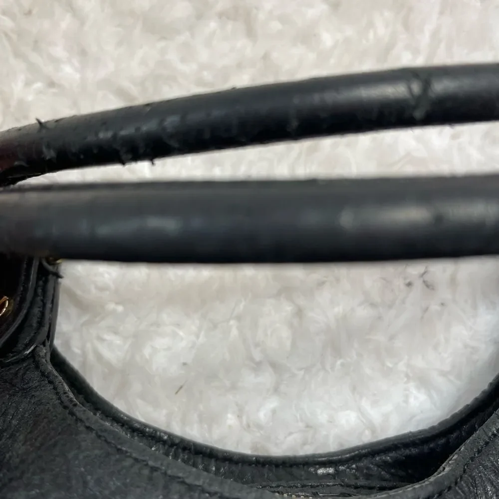 Michael Kors Black Pebble Leather Satchel with gold tone hardwares and accents.